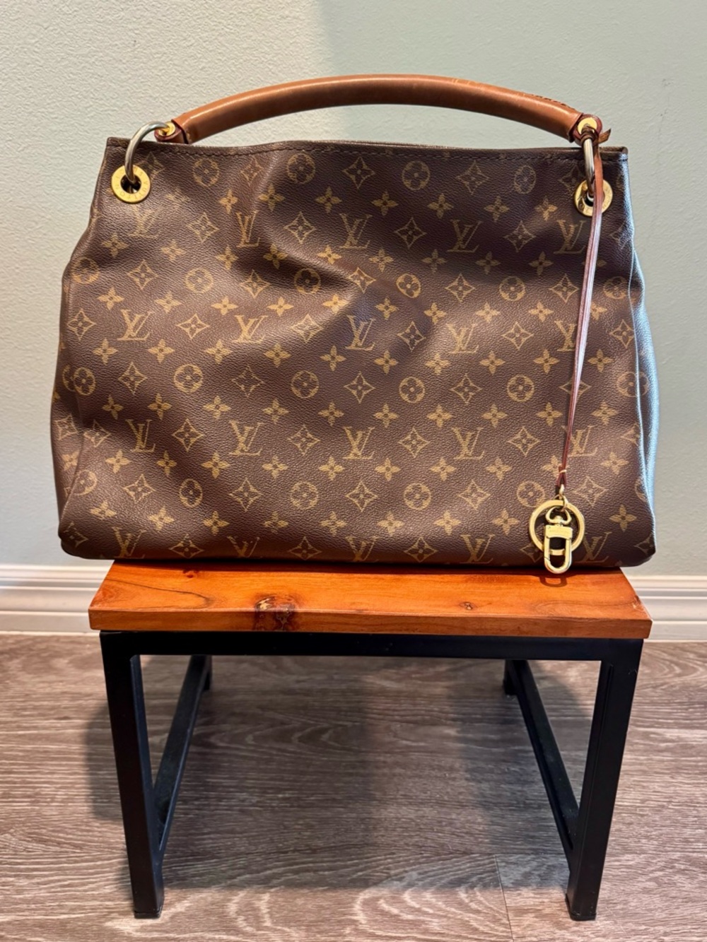 Louis Vuitton LV Monogram Artsy MM with braided vachetta leather handle.